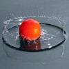 splashing tomato
