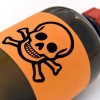 bottle labeled with skull and crossbones