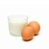 Glass with milk and eggs