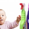 Infant child with cleaning chemicals