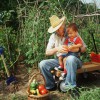 Elder with boy and farm produce