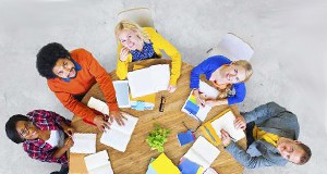 colorful people around a table