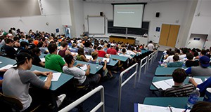 Students in an auditorium classroom.