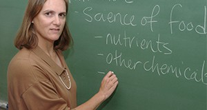 Elaine Turner at the chalkboard.