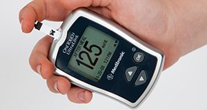 Hand held electronic diabetes monitoring devices. Metabolic diseases, blood sugar. Image used in the 2012 Annual Research Report.