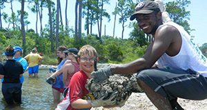 oysters in mesh bags for living shoreline Laura Tiu, Florida Sea Grant