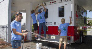2014 4H University Community Service Day at the Red Cross, washing an emergency vehicle.