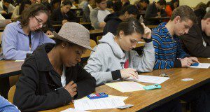 Students in a classroom taking a test. Image used in the 2014 Research Discoveries report.