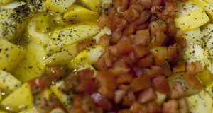 A cooked dish of diced tomatoes and yellow squash. Food, eating, nutrition, fruits and vegetables. UF/IFAS Photo by Tyler Jones.